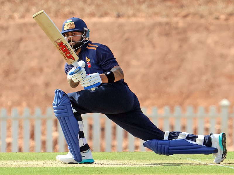 Kohli scores 77 vs Gujarat while Rohit faces a golden duck against Uttarakhand in VHT action