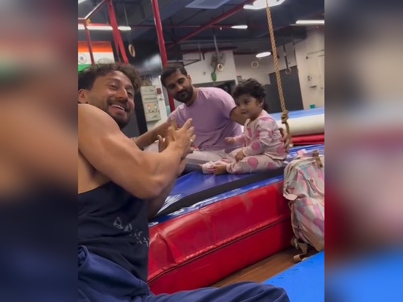 Jackie Shroff shares a heartwarming video of Tiger Shroff cheering for a toddler’s headstand attempt.