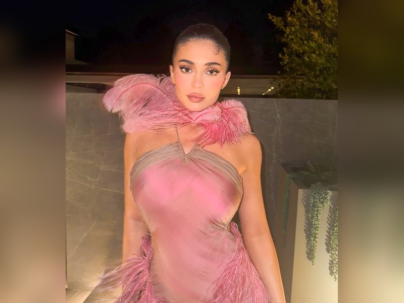 Kylie Jenner shows off her toned body in a gold bikini, sharing sultry selfies and vacation vibes. Kylie Jenner shows off her toned body in a gold bikini, sharing sultry selfies and vacation vibes.