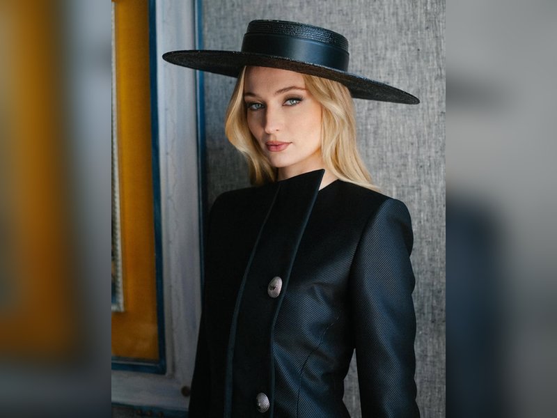 Sophie Turner reveals she can’t watch ‘Game of Thrones’ anymore, citing PTSD from its theme song.